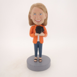 Picture of Custom Bobblehead Doll: Girl Holding Camera