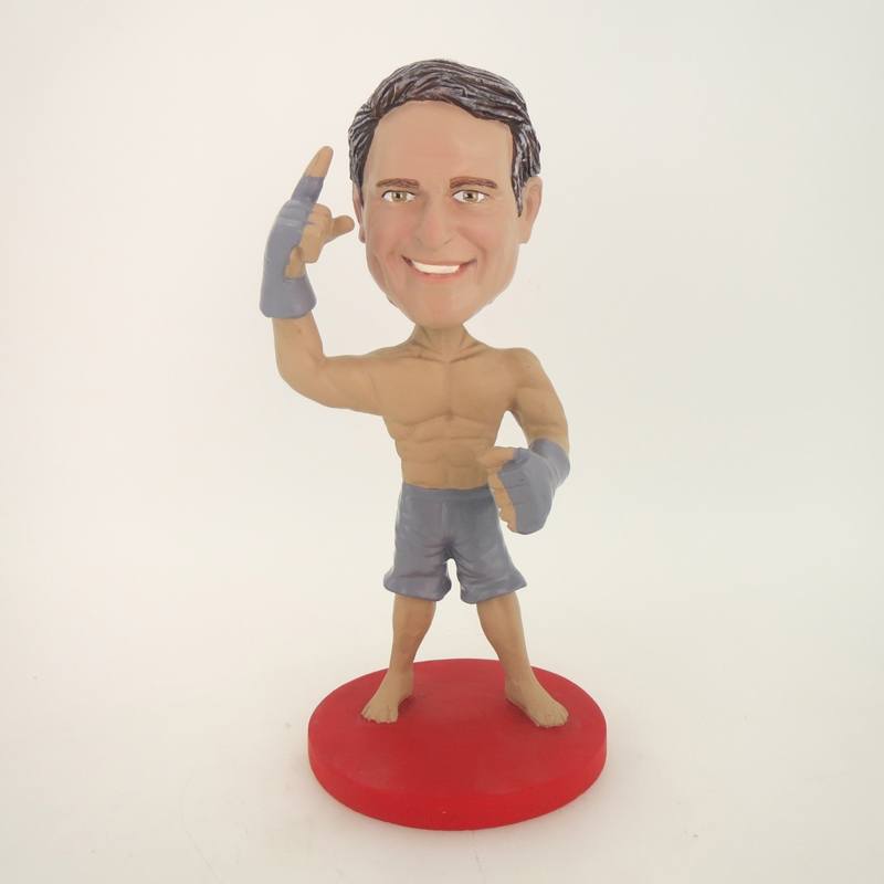 Picture of Custom Bobblehead Doll: Muscle Man Reading Boxing