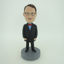 Picture of Custom Bobblehead Doll: Man In Bigger Coat With Bow